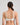 Model wears Rita Contour Bra in WHITE. On body back view