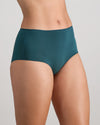 Model wears Au Naturel Full Brief in MEDITERRANEA. On body side view