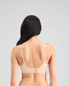 Model wears Comfit Collection Contour Bra in LATTE. On body back view