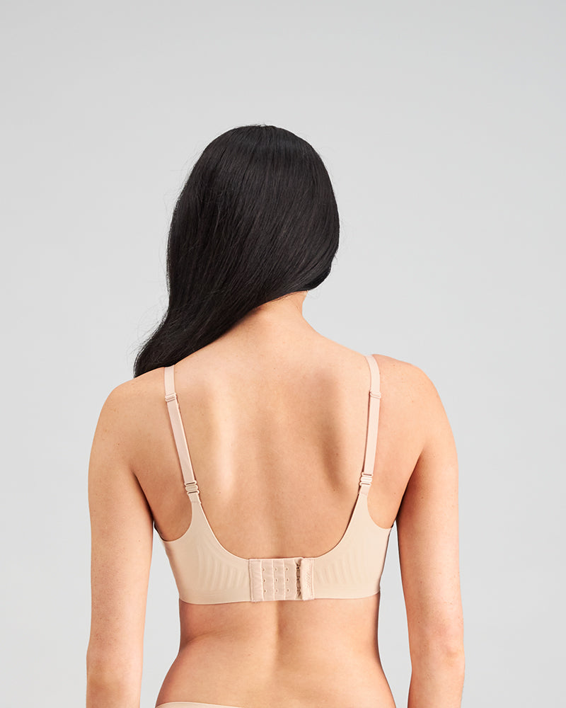 Model wears Comfit Collection Contour Bra in LATTE. On body back view