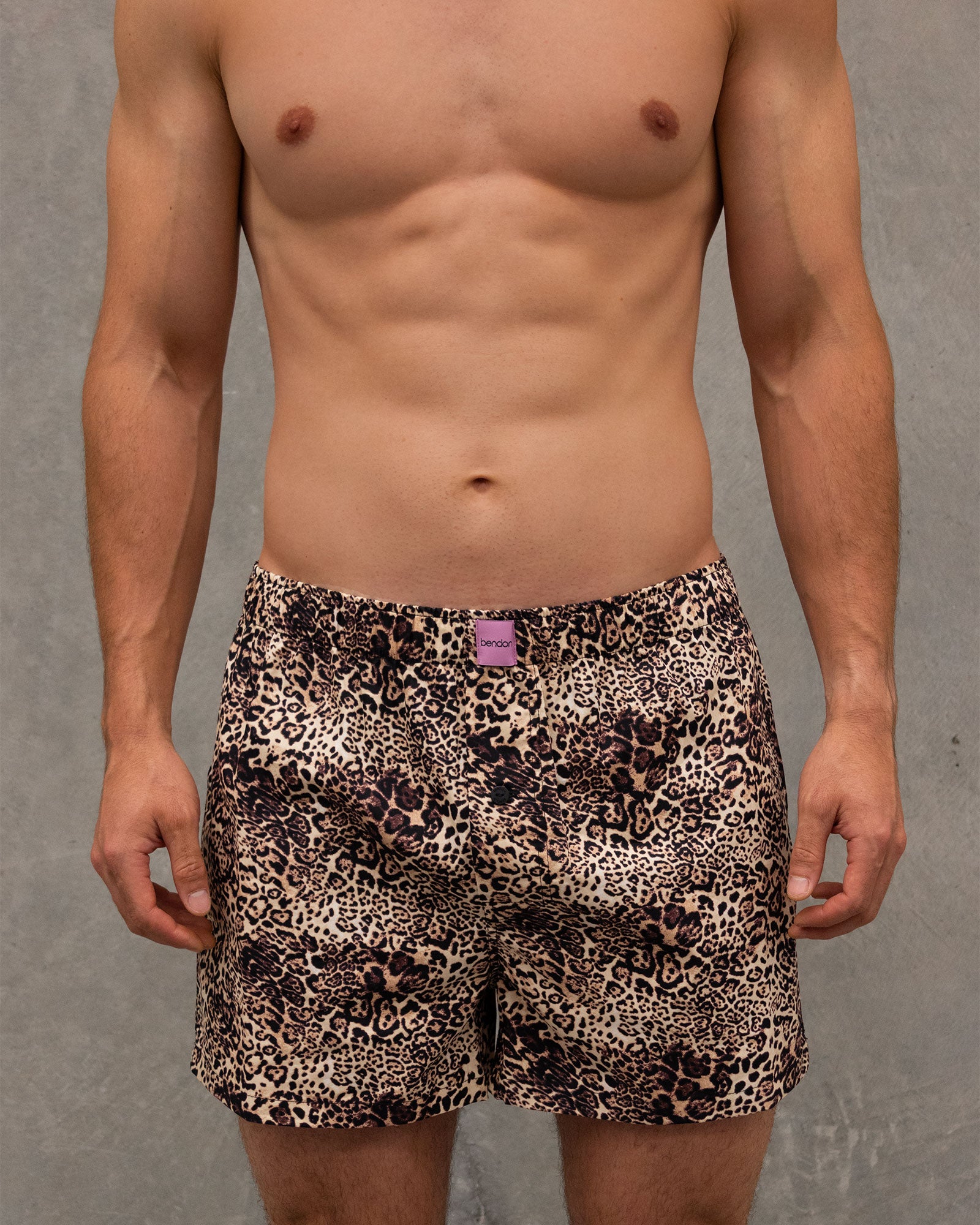 Model wears Sleigh The Night Boxer in WILD LYNX PRINT. On body front view