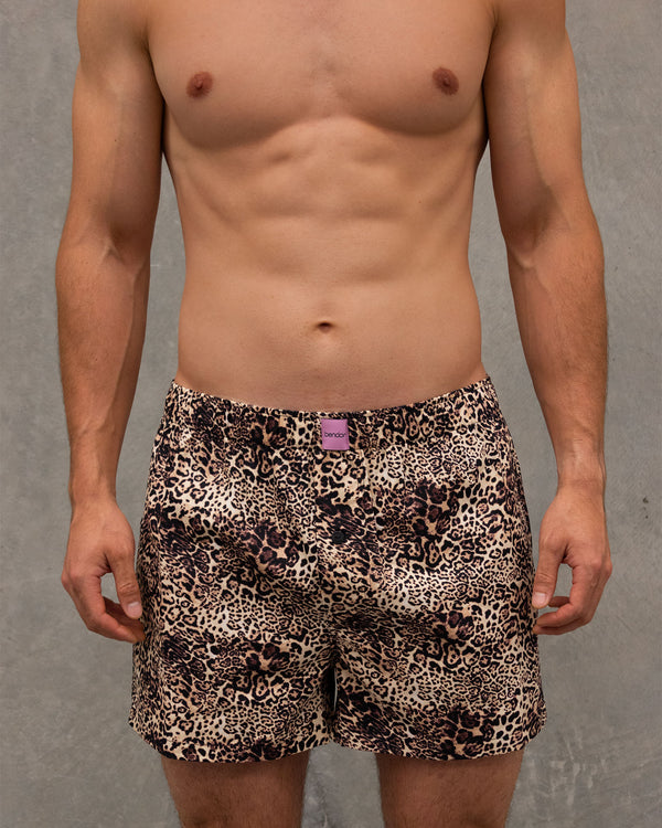 Model wears Sleigh The Night Boxer in WILD LYNX PRINT. On body front view