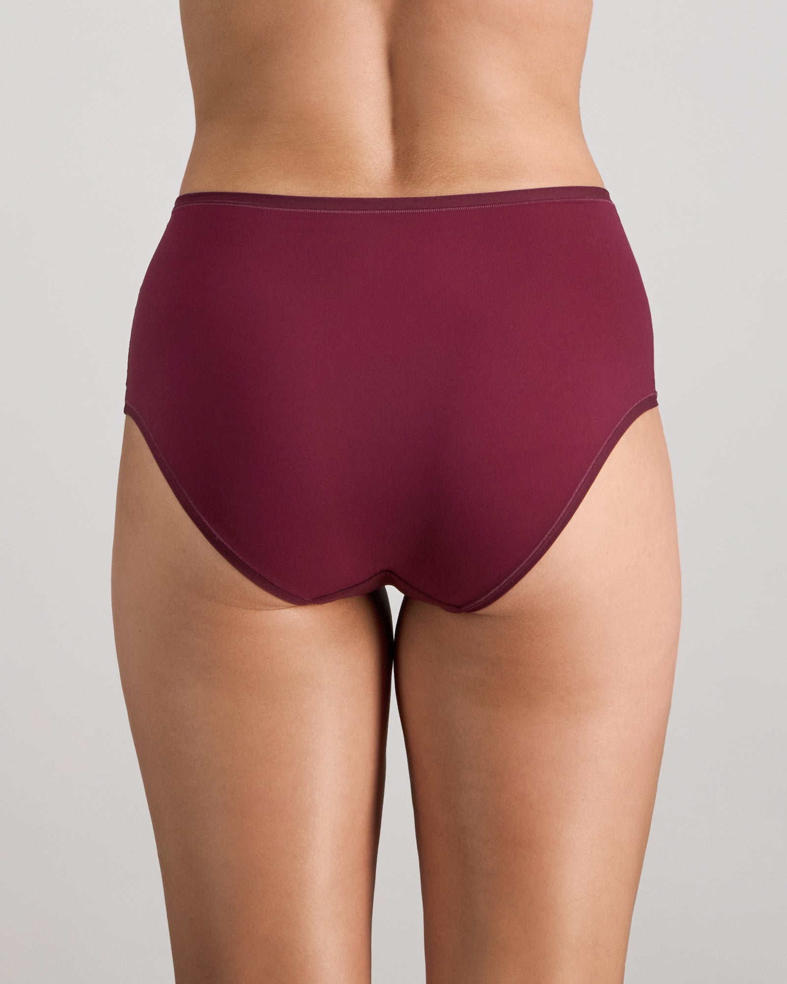 Model wears Extra-Ordinary Full Brief in FIG. On body back view