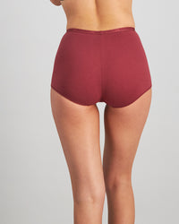 Model wears Body Cotton Full Brief Twin Pack in OXBLOOD RED/PEARL BLUSH. On body back view