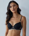 Model wears Geometric Lace Contour Bra in BLACK/TOASTED ALMOND. On body front view