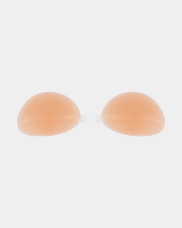 Adhesive Silicone Bra in Nude. Flat lay front view