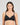 Model wears Bendon Body Lace Wire Free Bra in BLACK. On body front view