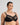 Model wears Coral Underwire Bra in BLACK. On body side view