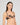 Model wears Niara Underwire Bra in BLACK. On body side view