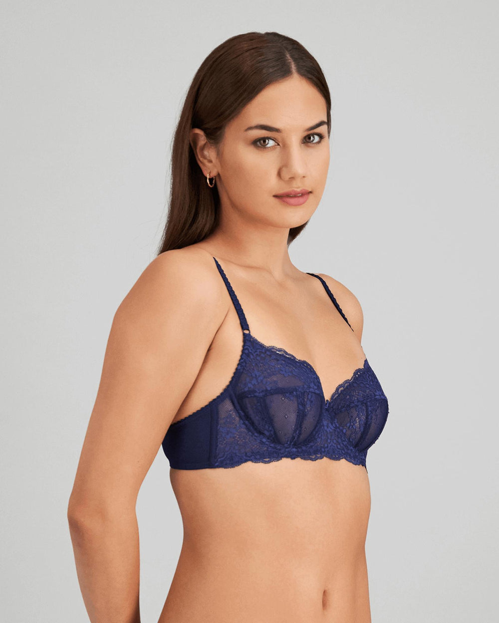 Model wears Sofia Underwire Bra in Medieval Blue. On body side view