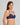 Model wears Sofia Underwire Bra in Medieval Blue. On body side view