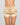 Model wears Silk Brilliance Short in CHAMPAGNE. On body front view