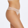 Model wears Captivate Me Thong in NUDE INTIME. On body side view