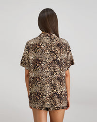 Model wears Dare To Dream Short Pj Set in WILD LYNX PRINT. On body back view