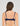 Model wears Damask Contour Bra in Medieval Blue. On body back view