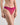Model wears All Lacey Thong in FANTASY FUCHSIA. On body side view
