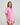 Model wears Holly Short PJ Set in FUCHSIA PINK. On body side view