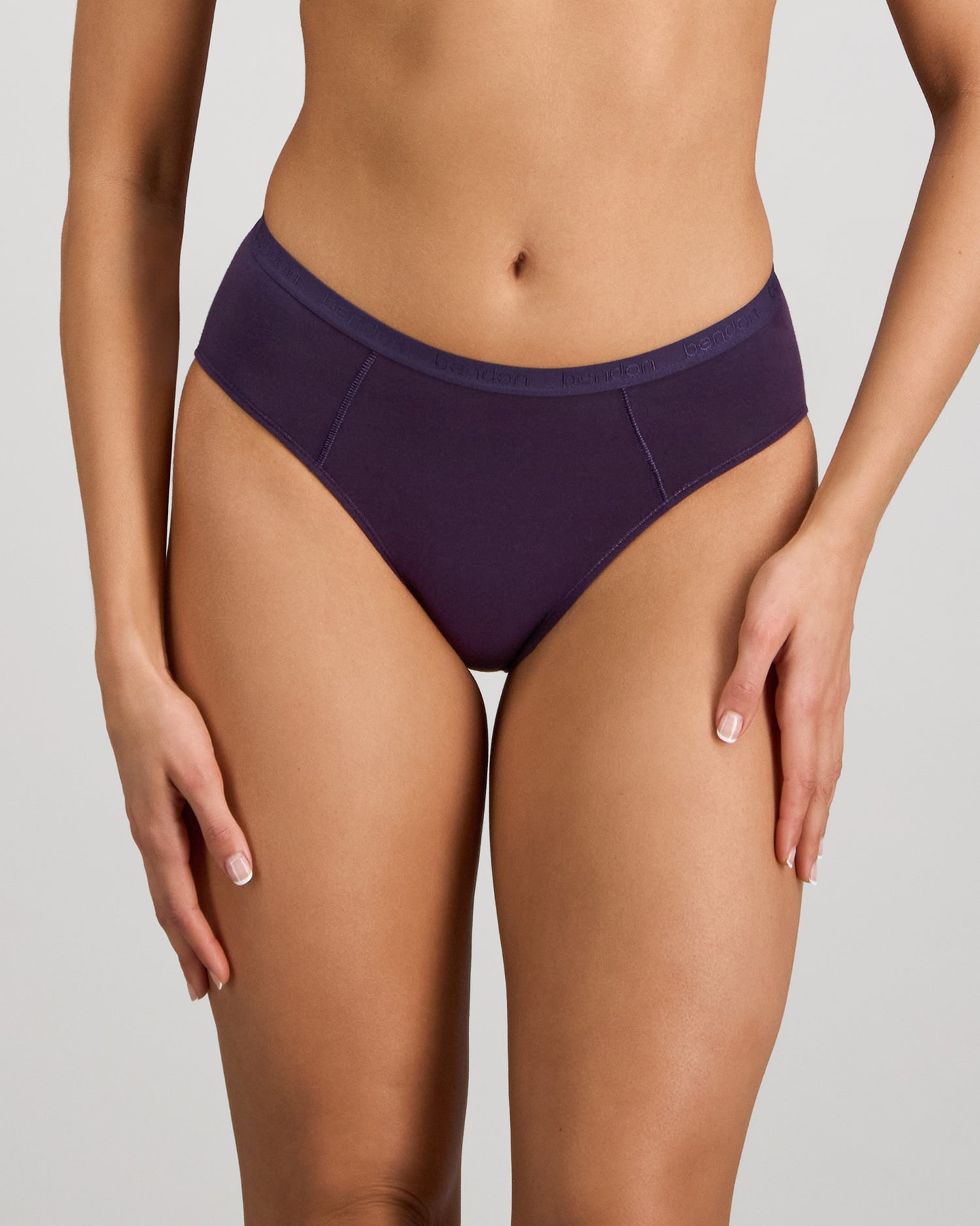 Model wears Body Cotton Bikini in PURPLE VELVET. On body front view