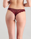 Model wears My Fit Lace Thong in WINDSOR WINE. On body back view