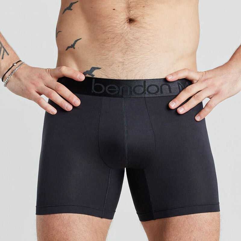 Model wears Bamboo Mens Trunk in BLACK. On body front view