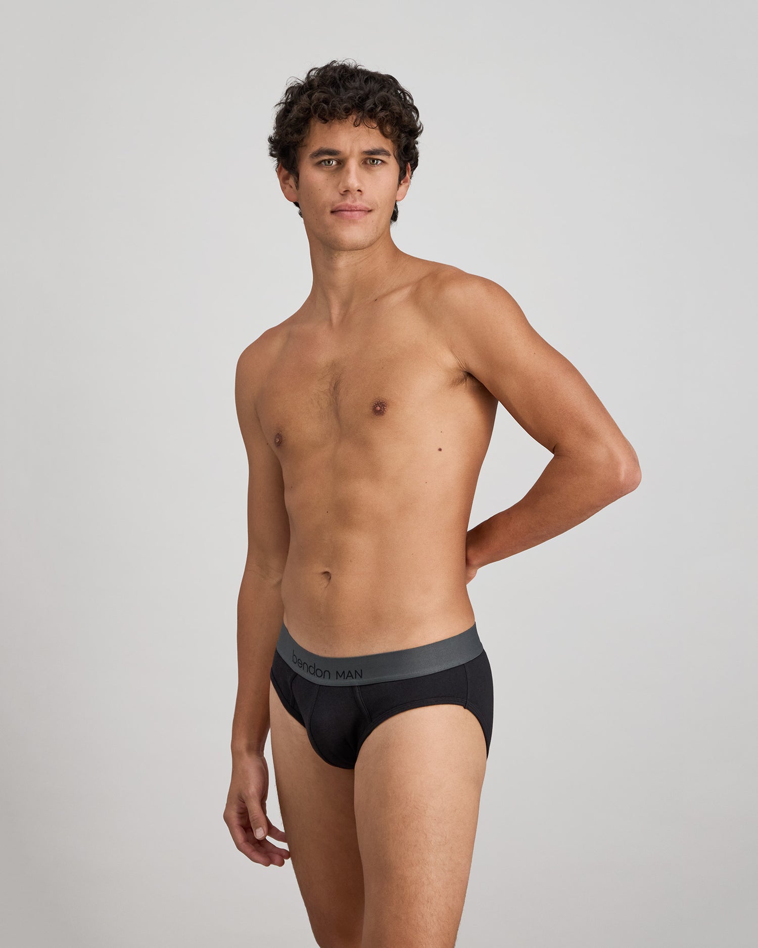 Cotton Low-Rise Mens Brief in BLACK. Flat lay back view