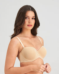 Model wears Sculptress Strapless Bra in LATTE. On body side view