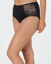 Model wears Embrace Full Brief in BLACK. On body side view