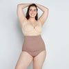 Model wears Medium Control High Waisted Brief in MOCHA. On body front view