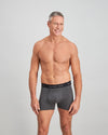 Model wears Cotton Classics Mens Trunk in GREY MARL. On body front view