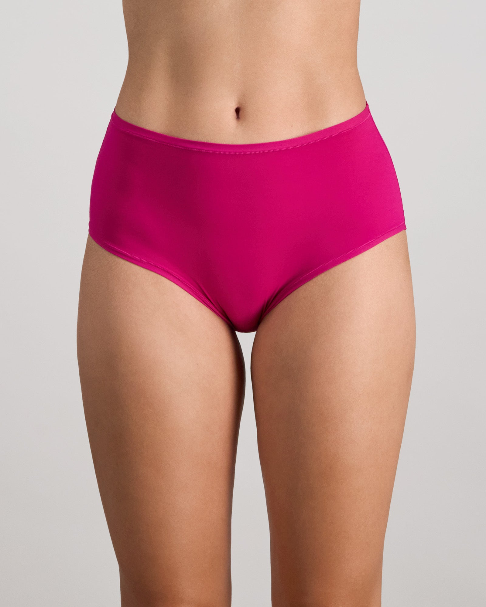Model wears Extra-Ordinary Full Brief in FANTASY FUCHSIA. On body front view