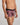 Model wears Retros Print Mens Trunk in SUMMER FRUITS PRINT. On body side view