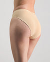 Model wears Body Cotton High Cut Brief in NATURAL. On body side view
