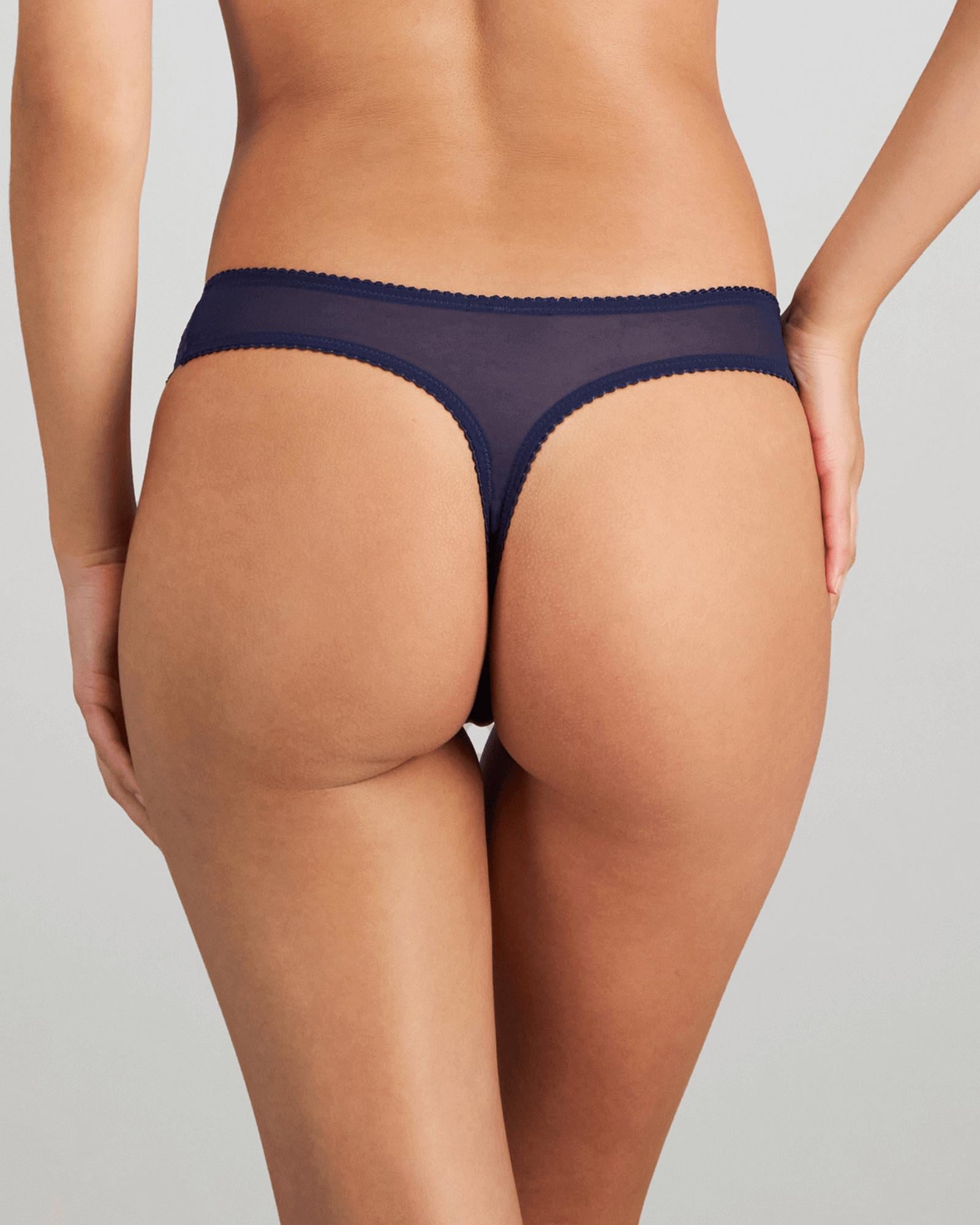 Model wears Sofia Thong in Medieval Blue. On body back view