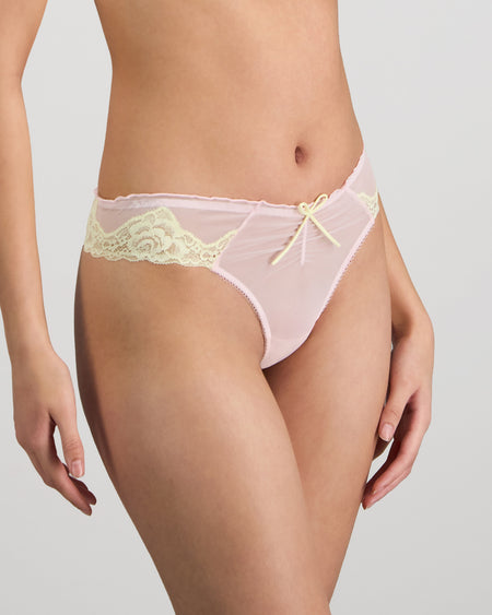 Model wears Dreamer Thong in PALE LILAC. On body side view