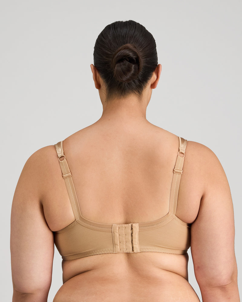 Model wears Charlotte Underwire Bra in TOFFEE. On body back view
