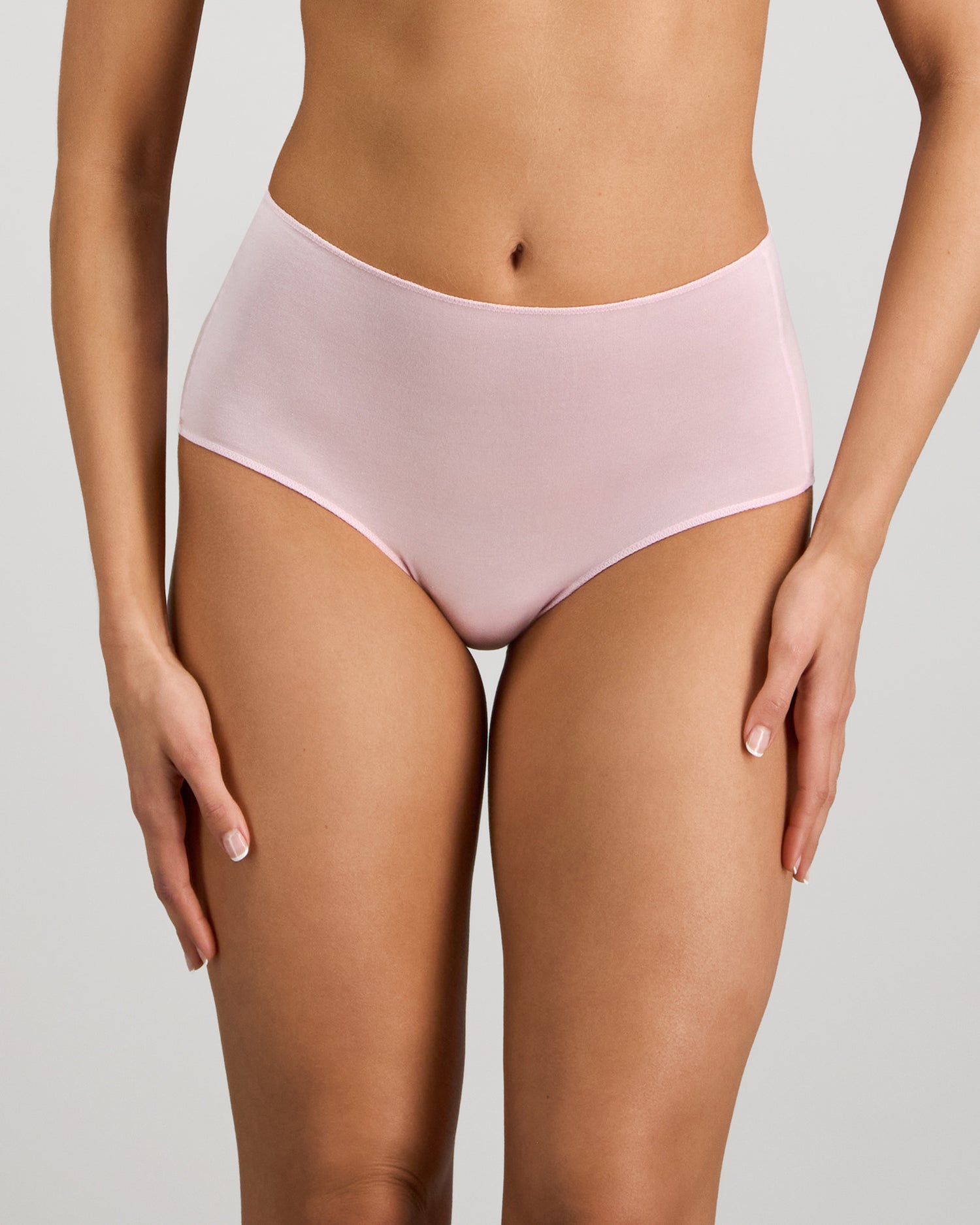 Model wears Au Naturel Full Brief in PALE LILAC. On body front view