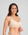 Model wears Comfit Collection Wire Free Bra in LATTE. On body side view