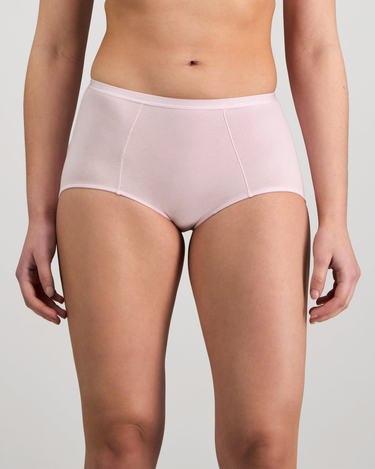 Model wears Body Cotton Full Brief in PALE LILAC. On body front view