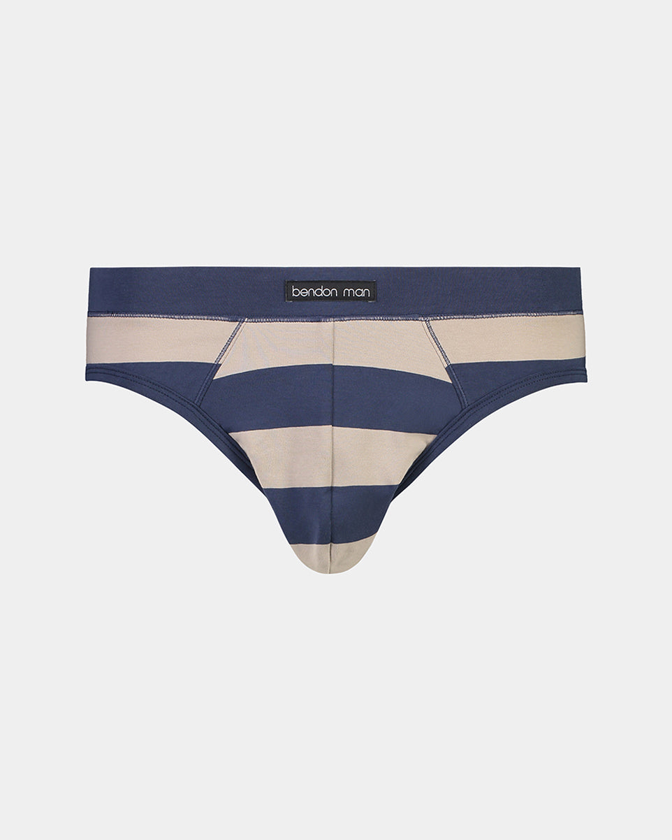 Model wears Rugby Stripe Mens Brief in RIVIERA STRIPE. On body front view