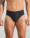 Model wears Cotton Stretch Mens Brief in BLACK PINSTRIPE. On body front view