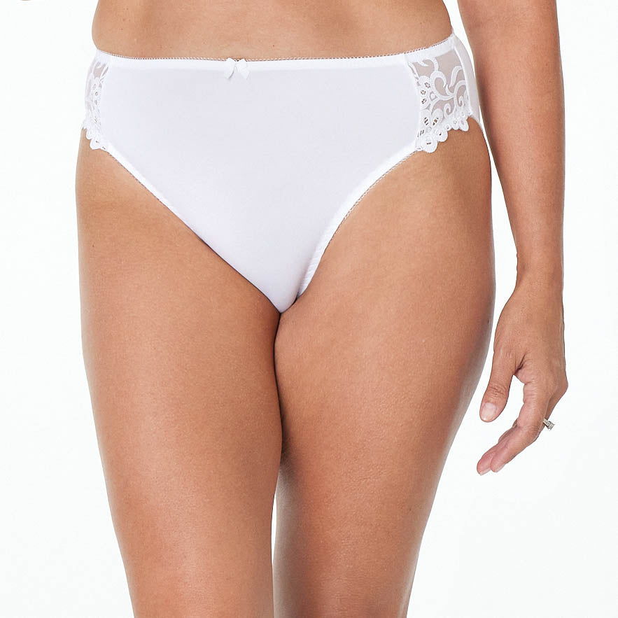 Model wears Coral High Cut Brief in WHITE. On body front view