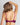 Model wears Sensuale Push Up Bra in RASPBERRY RADIANCE/BLACK. On body back view