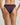 Model wears Wrapped In Stardust Tanga in PURPLE VELVET. On body back view
