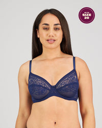 Model wears Eternal Underwire Bra in Medieval Blue. On body front view