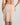 Model wears Understatement Slip in LATTE. On body back view