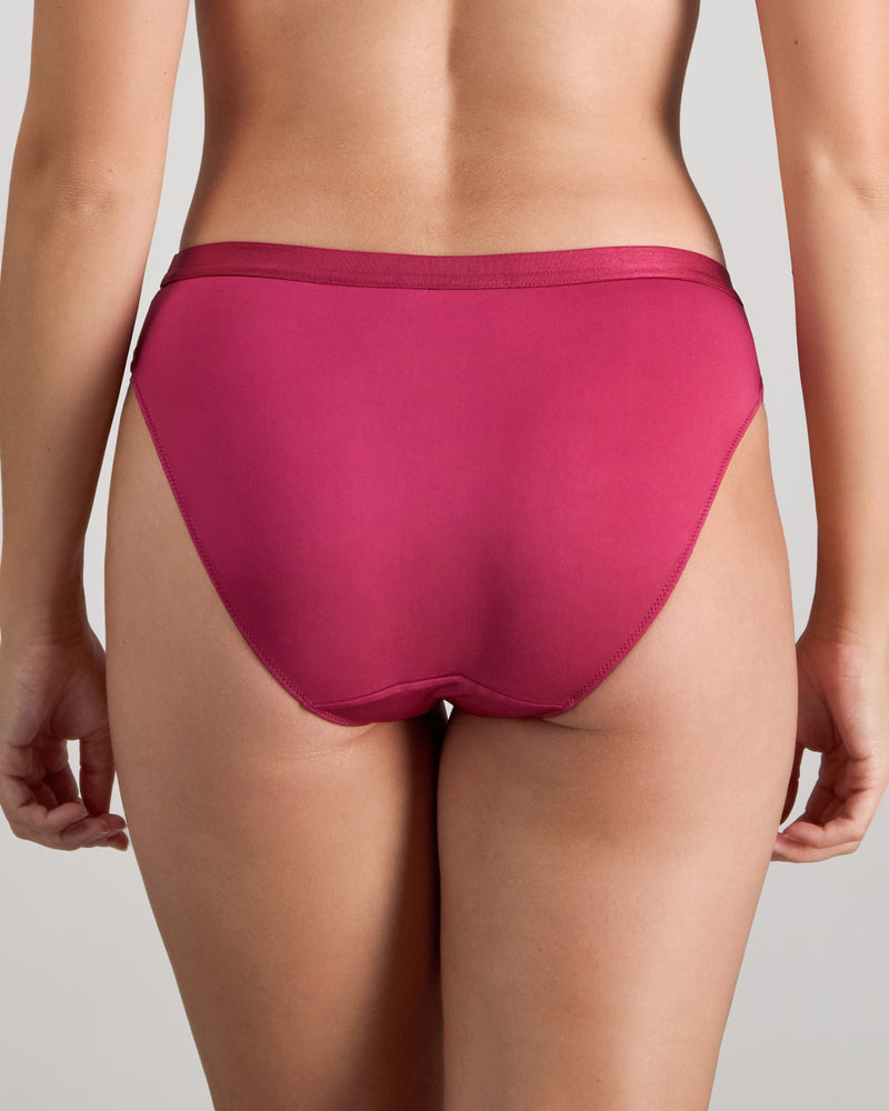 Model wears Legacy Bikini in BEAUJOLAIS. On body back view