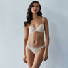 Model wears Stripe Elastic & Papertouch Tanga in SILVER PEONY. On body front view
