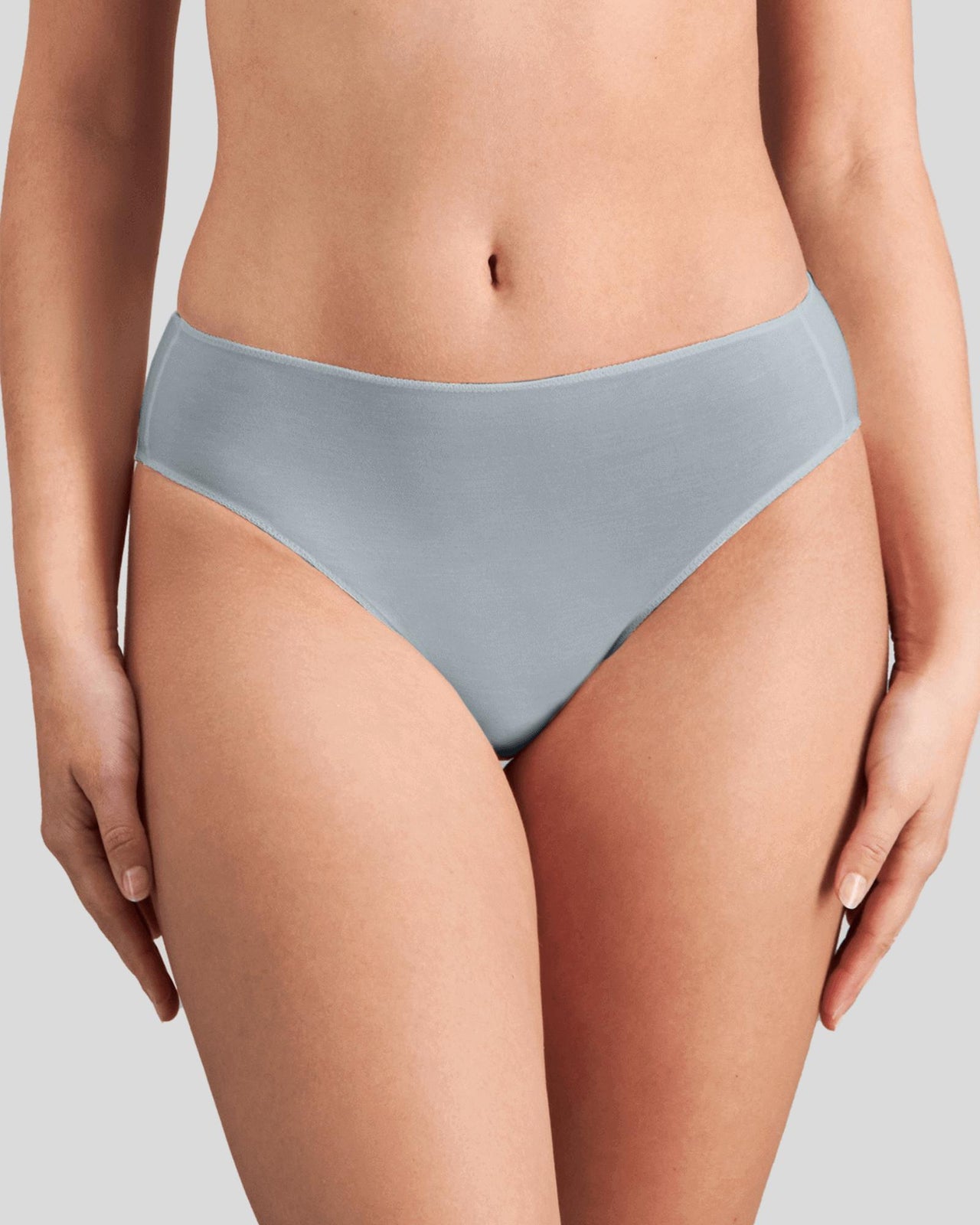 Model wears Au Naturel High Cut Brief in SLATE. On body front view