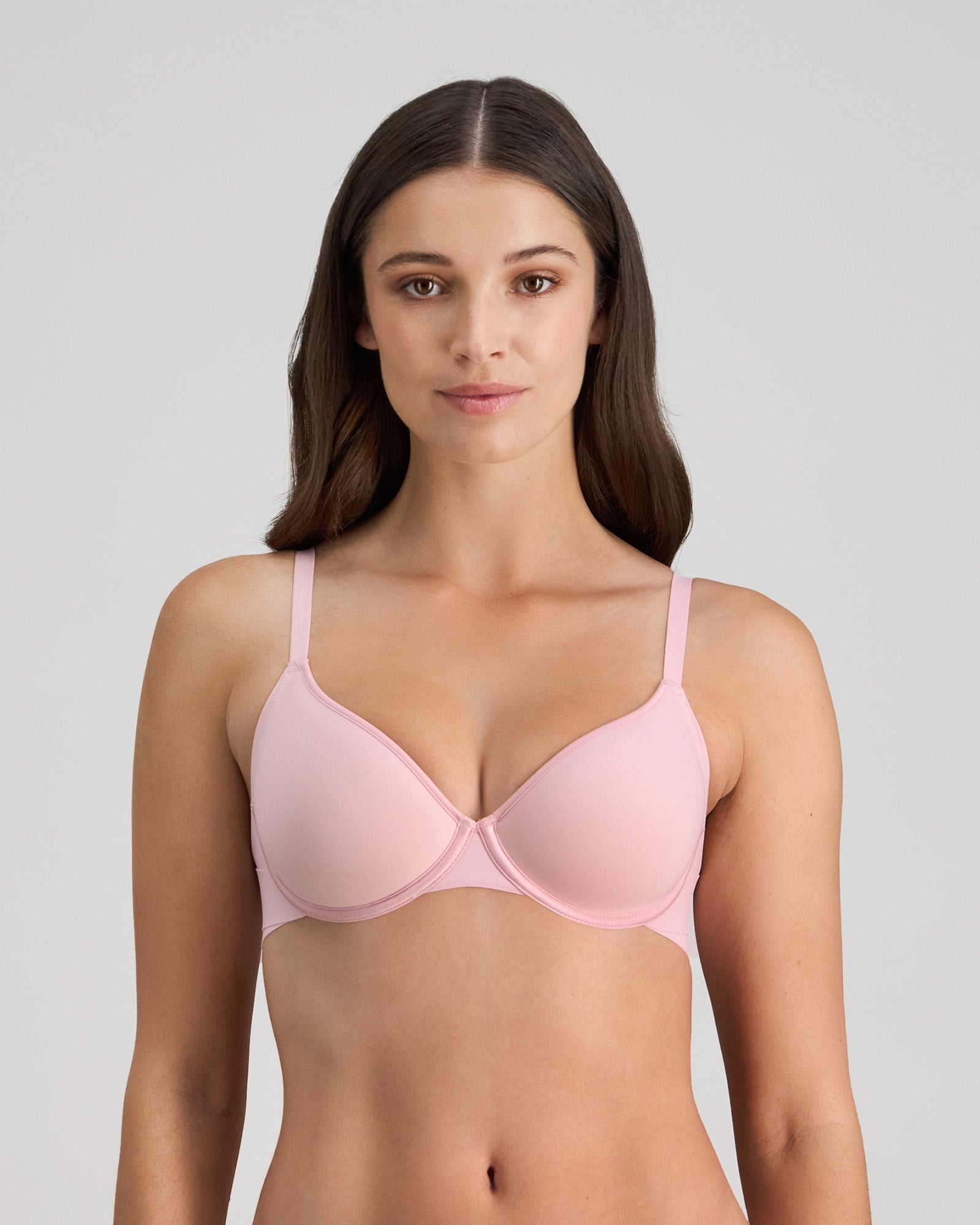 Model wears Flawless Form Contour Bra in ICY PINK. On body front view