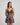 Model wears Adaline Chemise in BLACK FLORAL PRINT. On body front view